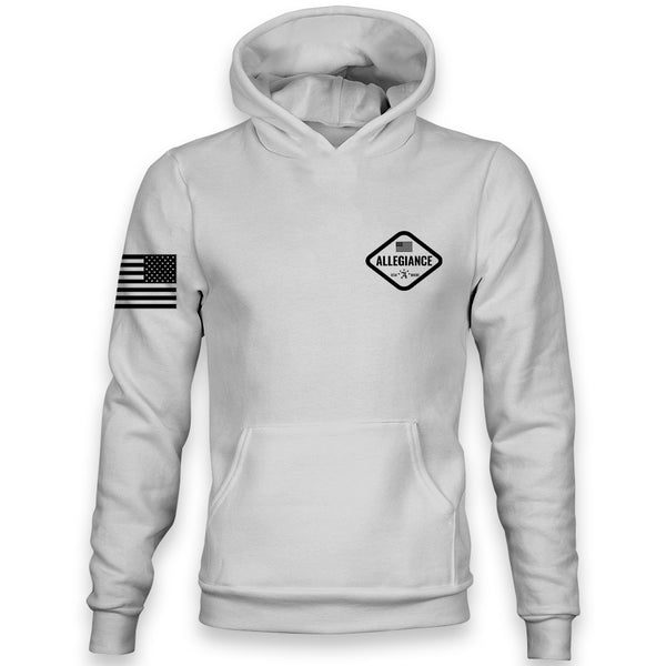 Hex Premium Hoodie front view featuring small diamond-shaped Allegiance logo on the chest and black American flag printed on the sleeve.