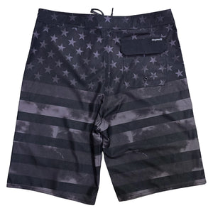 Back of Allegiance Stealth Banner Boardshort with full tonal black American flag graphic and flap-closure drainage pocket.
